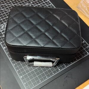 BNWOT Sleek Black Quilted Carry Case.